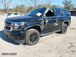 2019 Chevrolet Tahoe LT with VIN 1GNSKBKC3KR345776, listed as a IAAI auction lot 41674948 with 119,871 mi miles. Bid and sale history available at carsss.com. Image 17.