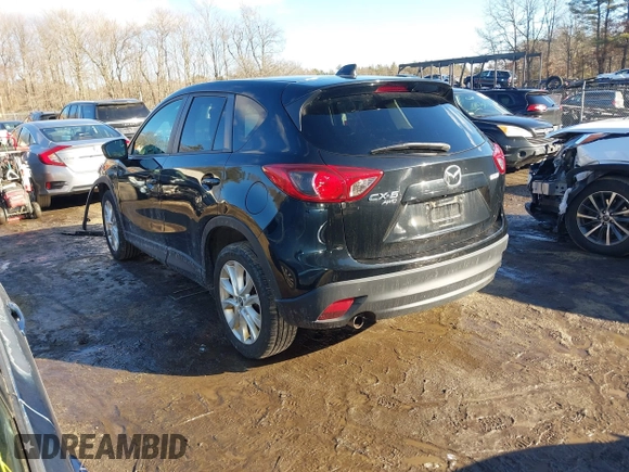 2014 Mazda CX-5 Grand Touring with VIN JM3KE4DY1E0303658, listed as a IAAI auction lot 41536769 with 158,777 mi miles. Bid and sale history available at carsss.com. Image 3.
