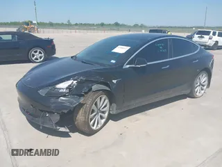 2019 Tesla Model 3 Mid Range z VIN 5YJ3E1EA3KF310976, wystawiony jako IAAI lot #41968012 z przebiegiem Nie podano mil oraz . Historia ofert i sprzedaży dostępna na DreamBid. Obrazek 18.