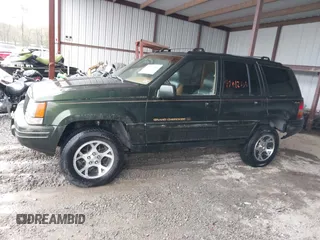 1997 Jeep Grand Cherokee Limited with VIN 1J4GZ78Y5VC723429, listed as a IAAI auction lot 42012836 with 231,126 mi miles. Bid and sale history available at carsss.com. Image 14.