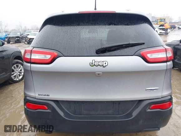 2016 Jeep Cherokee Latitude with VIN 1C4PJLCB7GW273440, listed as a IAAI auction lot 41452456 with 106,048 mi miles. Bid and sale history available at carsss.com. Image 16.