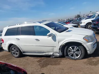 2011 Mercedes-Benz GL-Class GL 550 with VIN 4JGBF8GE7BA749183, listed as a IAAI auction lot 41626371 with 132,215 mi miles. Bid and sale history available at carsss.com. Image 13.