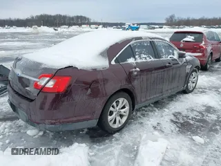 2011 Ford Taurus SEL with VIN 1FAHP2EW4BG115630, listed as a IAAI auction lot 41276945 with 166,867 mi miles. Bid and sale history available at carsss.com. Image 4.