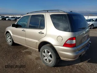 2002 Mercedes-Benz M 320/430/500 with VIN 4JGAB75E02A310556, listed as a IAAI auction lot 41685541 with 180,930 mi miles and . Bid and sale history available at DreamBid. Image 3.