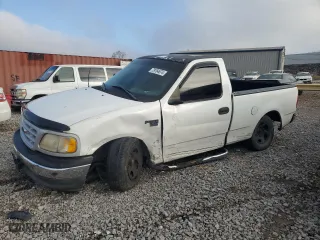 1999 Ford F-150 Work Series with VIN 1FTRF17W3XKA08534, listed as a Copart auction lot 79764674 with 0 mi miles and Salvage Title. Bid and sale history available at carsss.com. Image 1.