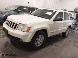 2010 Jeep Grand Cherokee Laredo with VIN 1J4PR4GK1AC143486, listed as a IAAI auction lot 41761763 with 159,139 mi miles. Bid and sale history available at carsss.com. Image 18.
