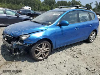 2011 Hyundai Elantra Touring SE with VIN KMHDC8AE5BU099410, listed as a Copart auction lot 67699694 with 183,226 mi miles and Salvage Title. Bid and sale history available at carsss.com. Image 1.