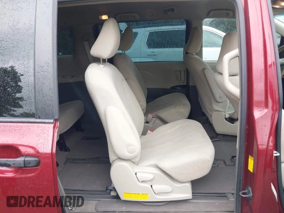 2014 Toyota Sienna L with VIN 5TDZK3DC0ES457242, listed as a IAAI auction lot 42307360 with 86,857 mi miles and . Bid and sale history available at DreamBid. Image 8.