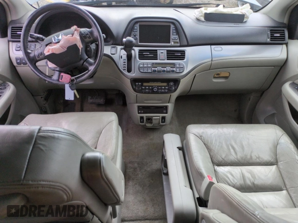 2005 Honda Odyssey Touring z VIN 5FNRL38855B051447, wystawiony jako Copart lot #57144925 z przebiegiem 186 476 mil mil oraz Szkoda całkowita • Salvage title. Historia ofert i sprzedaży dostępna na DreamBid. Obrazek 8.