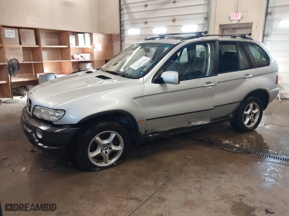 2003 BMW X5 3.0i with VIN 5UXFA53543LV80219, listed as a IAAI auction lot 41555874 with 247,481 mi miles. Bid and sale history available at carsss.com. Image 2.