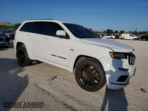 2018 Jeep Grand Cherokee Overland z VIN 1C4RJFCT1JC502125, wystawiony jako Copart lot #61613274 z przebiegiem 59 692 mil mil oraz Nie do naprawy • Non repairable. Historia ofert i sprzedaży dostępna na DreamBid. Obrazek 4.