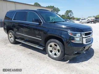 2019 Chevrolet Tahoe LT with VIN 1GNSCBKC4KR231153, listed as a IAAI auction lot 42017325 with 116,960 mi miles. Bid and sale history available at carsss.com. Image 1.