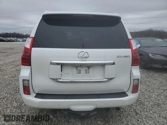 2013 Lexus GX 460 Premium z VIN JTJJM7FX7D5062605, wystawiony jako Copart lot #44064805 z przebiegiem 146 852 mil mil oraz Szkoda całkowita • Salvage title. Historia ofert i sprzedaży dostępna na DreamBid. Obrazek 6.