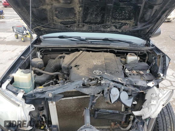 2013 Toyota Tacoma z VIN 5TFLU4EN1DX066986, wystawiony jako Copart lot #55480735 z przebiegiem 165 991 mil mil oraz Szkoda całkowita • Salvage title. Historia ofert i sprzedaży dostępna na DreamBid. Obrazek 11.