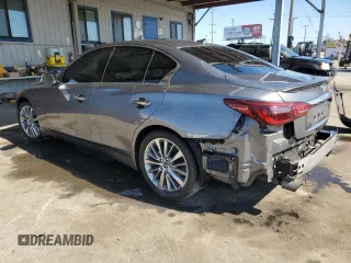 2019 Infiniti Q50 Luxe z VIN JN1EV7AP4KM514928, wystawiony jako Copart lot #56694755 z przebiegiem 63 705 mil mil oraz Szkoda całkowita • Salvage title. Historia ofert i sprzedaży dostępna na DreamBid. Obrazek 2.