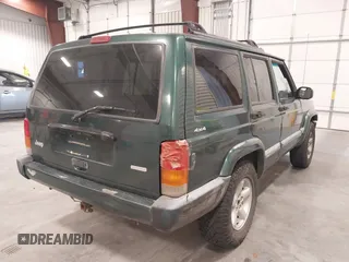 2000 Jeep Cherokee with VIN 1J4FF48SXYL116106, listed as a IAAI auction lot 42610059 with 191,513 mi miles and . Bid and sale history available at DreamBid. Image 4.