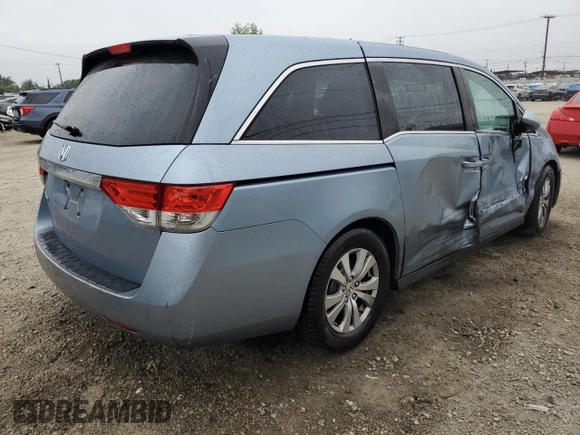 2014 Honda Odyssey EX-L with VIN 5FNRL5H68EB103941, listed as a Copart auction lot 60715095 with 109,013 mi miles and Salvage title. Bid and sale history available at DreamBid. Image 3.