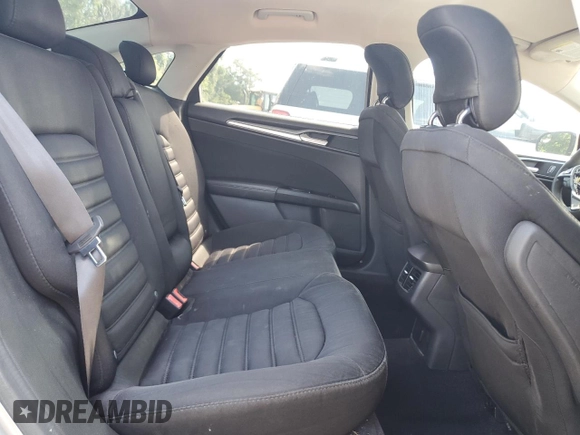 2015 Ford Fusion SE Hybrid z VIN 3FA6P0LU7FR102723, wystawiony jako Copart lot #62334345 z przebiegiem 136 341 mil mil oraz Nie do naprawy • Non repairable. Historia ofert i sprzedaży dostępna na DreamBid. Obrazek 10.