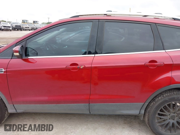 2013 Ford Escape Titanium with VIN 1FMCU0J9XDUD90999, listed as a IAAI auction lot 42373924 with 179,477 mi miles and . Bid and sale history available at DreamBid. Image 14.