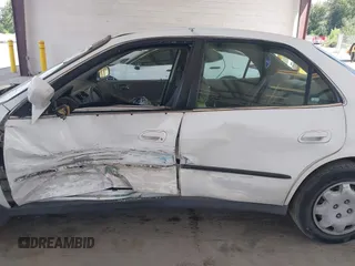 1998 Honda Accord LX with VIN 1HGCG5640WA004358, listed as a IAAI auction lot 42643808 with Not provided miles and . Bid and sale history available at DreamBid. Image 6.