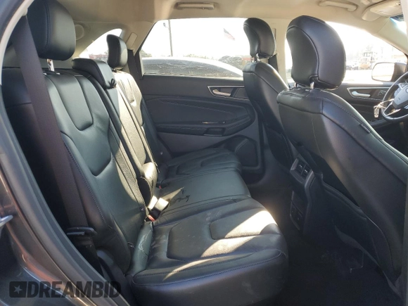 2019 Ford Edge Titanium z VIN 2FMPK3K96KBC31844, wystawiony jako Copart lot #85897344 z przebiegiem 59 421 mil mil oraz Szkoda całkowita • Salvage title. Historia ofert i sprzedaży dostępna na DreamBid. Obrazek 11.