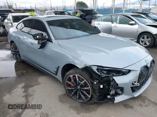 2024 BMW i4 eDrive35 z VIN WBY43AW01RFS14445, wystawiony jako IAAI lot #41764130 z przebiegiem 8 133 mil mil oraz . Historia ofert i sprzedaży dostępna na DreamBid. Obrazek 1.