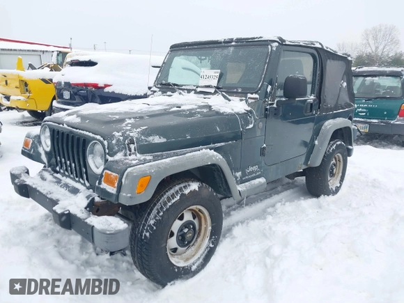 2004 Jeep Wrangler SE with VIN 1J4FA29154P778915, listed as a IAAI auction lot 41245325 with 205,852 mi miles and . Bid and sale history available at DreamBid. Image 2.
