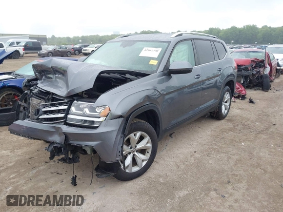 2018 Volkswagen Atlas SE z VIN 1V2KR2CAXJC517240, wystawiony jako IAAI lot #42361370 z przebiegiem 129 546 mil mil oraz . Historia ofert i sprzedaży dostępna na DreamBid. Obrazek 2.