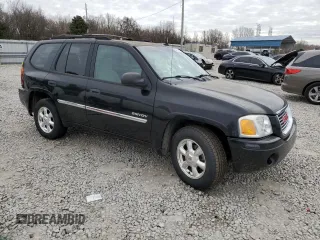 2006 GMC Envoy SLT with VIN 1GKDS13SX62354690, listed as a Copart auction lot 84138814 with 194,669 mi miles and Salvage Title. Bid and sale history available at carsss.com. Image 4.