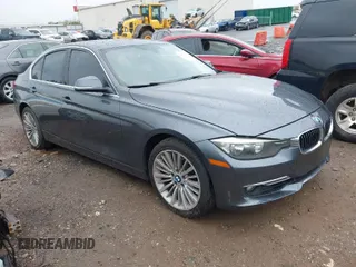 2012 BMW 3 Series 328i with VIN WBA3A5C50CF342321, listed as a IAAI auction lot 41914770 with 185,315 mi miles. Bid and sale history available at carsss.com. Image 1.