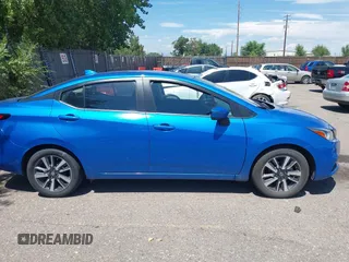 2021 Nissan Versa SV with VIN 3N1CN8EV1ML855643, listed as a IAAI auction lot 42772321 with 56,604 mi miles and . Bid and sale history available at DreamBid. Image 13.