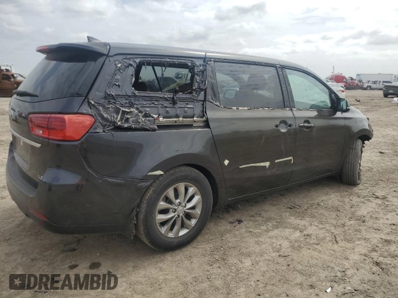 2021 Kia Sedona LX with VIN KNDMB5C17M6665266, listed as a Copart auction lot 48129495 with 57,274 mi miles and Salvage Title. Bid and sale history available at carsss.com. Image 3.