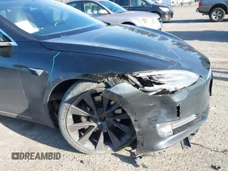 2018 Tesla Model S 75D with VIN 5YJSA1E28JF273809, listed as a IAAI auction lot 42029434 with 85,972 mi miles and . Bid and sale history available at DreamBid. Image 6.