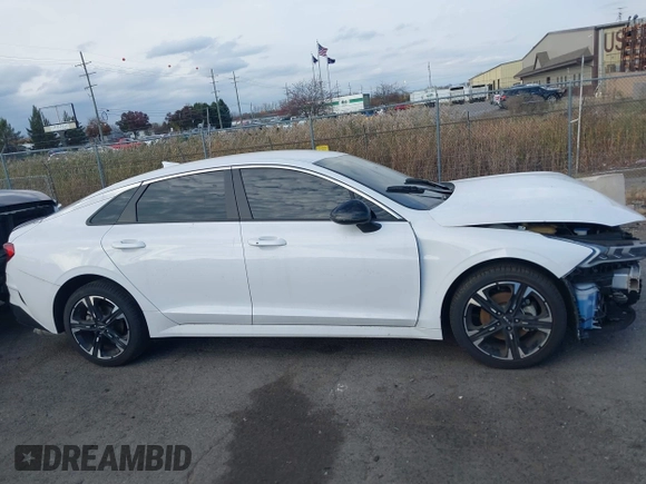 2024 Kia K5 GT-Line z VIN 5XXG64J29RG259036, wystawiony jako IAAI lot #40777274 z przebiegiem 6716 mil mil oraz . Historia ofert i sprzedaży dostępna na DreamBid. Obrazek 13.