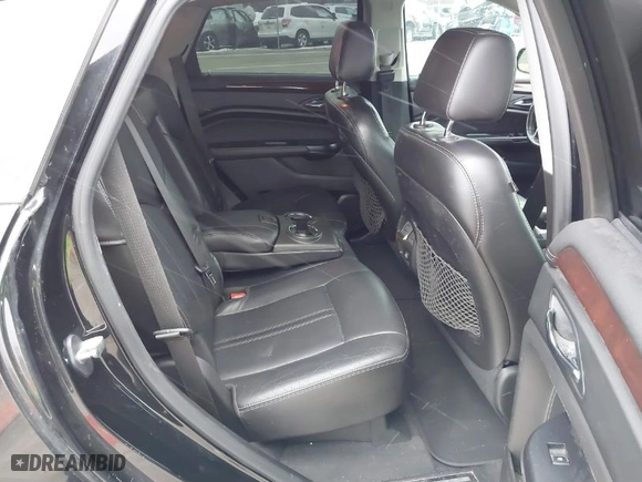 2015 Cadillac SRX Performance Collection with VIN 3GYFNFE35FS546905, listed as a IAAI auction lot 41588405 with 145,620 mi miles. Bid and sale history available at carsss.com. Image 8.