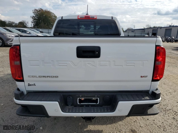 2021 Chevrolet Colorado 2WD Z71 with VIN 1GCGSDEN6M1185112, listed as a Copart auction lot 79696804 with 63,742 mi miles and Salvage Title. Bid and sale history available at carsss.com. Image 6.