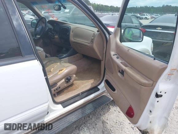 1999 Ford Explorer XL с VIN 1FMDU32E7XZC12721, выставлен на аукционе IAAI как лот 42093767 с пробегом 229 671 миль миль и . История ставок и продаж доступна на DreamBid. Изображение 5.