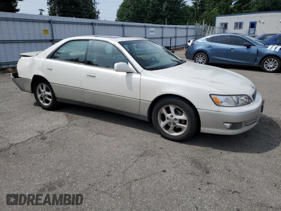 2000 Lexus ES 300 with VIN JT8BF28G6Y5099537, listed as a Copart auction lot 61873595 with 167,090 mi miles and Salvage title. Bid and sale history available at DreamBid. Image 4.