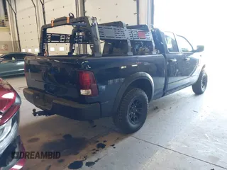 2021 Ram 1500 Warlock with VIN 1C6RR7GG9MS571707, listed as a IAAI auction lot 42218509 with 64,539 mi miles and . Bid and sale history available at DreamBid. Image 4.