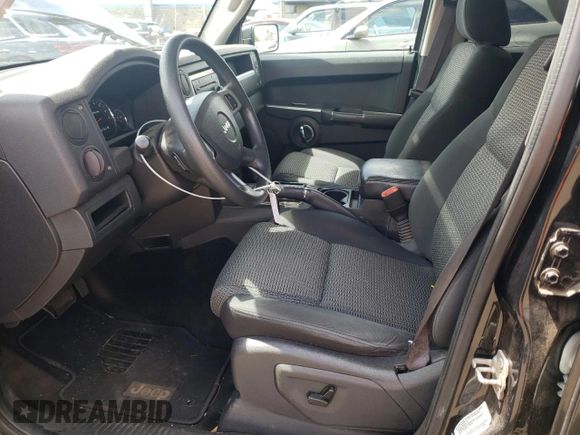 2009 Jeep Commander Sport z VIN 1J8HG48K39C554570, wystawiony jako Copart lot #52667825 z przebiegiem 194 886 mil mil oraz Szkoda całkowita • Salvage title. Historia ofert i sprzedaży dostępna na DreamBid. Obrazek 7.
