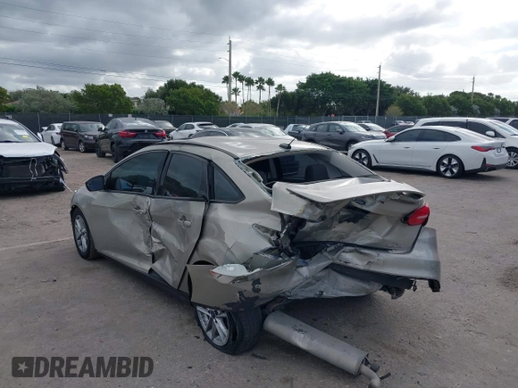 2015 Ford Focus SE with VIN 1FADP3F29FL292655, listed as a IAAI auction lot 41090945 with 106,060 mi miles. Bid and sale history available at carsss.com. Image 6.