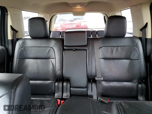 2017 Ford Flex Limited z VIN 2FMGK5D89HBA03930, wystawiony jako Copart lot #40490264 z przebiegiem 62 088 mil mil oraz Szkoda całkowita • Salvage title. Historia ofert i sprzedaży dostępna na DreamBid. Obrazek 10.