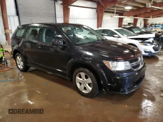 2013 Dodge Journey American Value with VIN 3C4PDCABXDT502334, listed as a Copart auction lot 58428235 with 162,009 mi miles and Clean title. Bid and sale history available at DreamBid. Image 4.