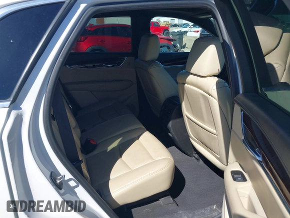 2017 Cadillac XT5 Premium Luxury FWD z VIN 1GYKNCRS9HZ106397, wystawiony jako IAAI lot #41659420 z przebiegiem 54 615 mil mil oraz . Historia ofert i sprzedaży dostępna na DreamBid. Obrazek 8.
