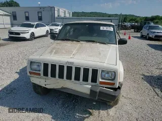 1999 Jeep Cherokee Sport z VIN 1J4FF68S3XL597049, wystawiony jako Copart lot #58736325 z przebiegiem 134 684 mil mil oraz Nie do naprawy • Non repairable. Historia ofert i sprzedaży dostępna na DreamBid. Obrazek 13.