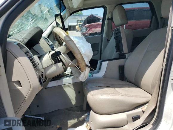 2010 Mercury Mariner Premier with VIN 4M2CN8H70AKJ17236, listed as a Copart auction lot 54974705 with Not provided miles and Salvage title. Bid and sale history available at DreamBid. Image 7.