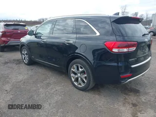 2016 Kia Sorento SX with VIN 5XYPKDA51GG073912, listed as a IAAI auction lot 42020501 with 172,836 mi miles. Bid and sale history available at carsss.com. Image 3.