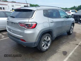 2021 Jeep Compass Limited with VIN 3C4NJCCB0MT573569, listed as a IAAI auction lot 42301154 with 106,812 mi miles and . Bid and sale history available at DreamBid. Image 4.