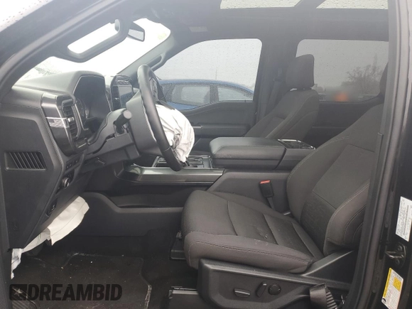 2023 Ford F-150 XL with VIN 1FTFW1ED2PFD30384, listed as a Copart auction lot 55593215 with 21,107 mi miles and Clean title. Bid and sale history available at DreamBid. Image 7.
