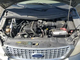 2004 Ford Freestar SEL z VIN 2FMDA522X4BA41942, wystawiony jako Copart lot #54007555 z przebiegiem 119 877 mil mil oraz Szkoda całkowita • Salvage title. Historia ofert i sprzedaży dostępna na DreamBid. Obrazek 12.